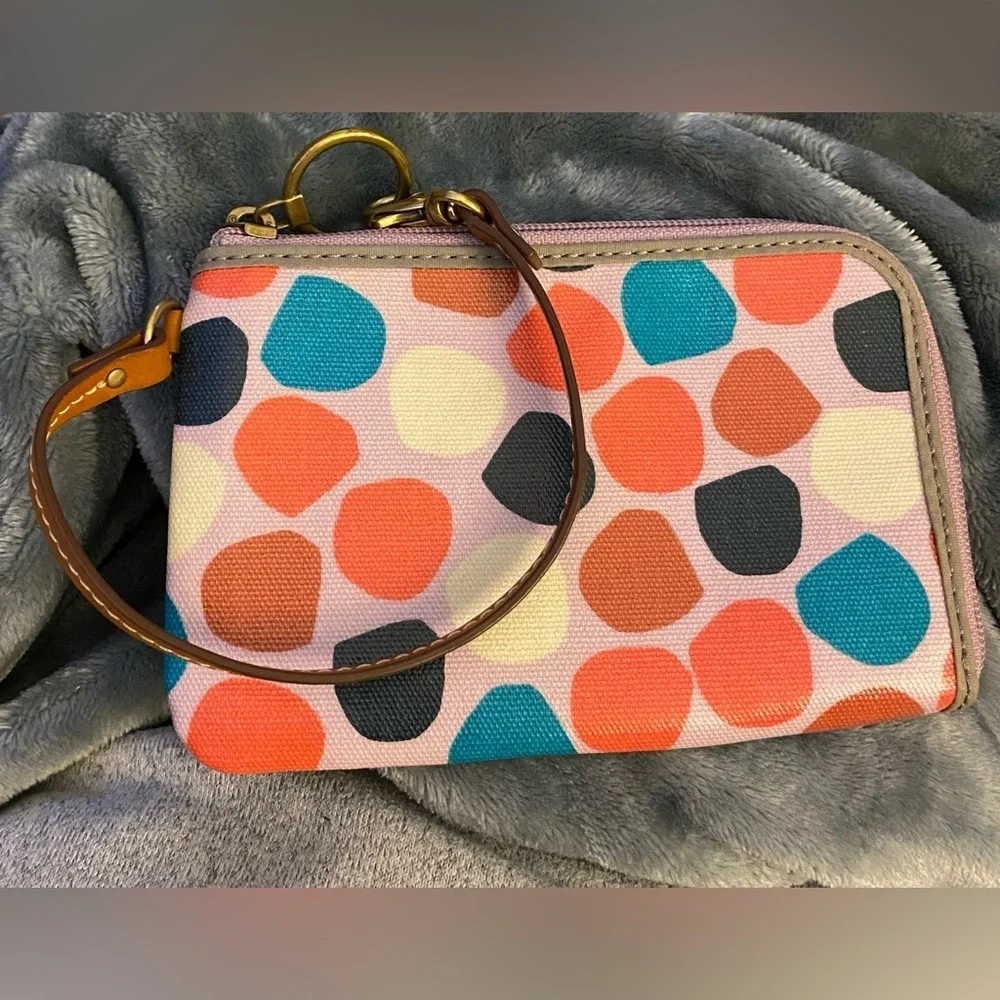 Fossil wristlet pinkish with multicolored dots zippered closure card slots. OSP